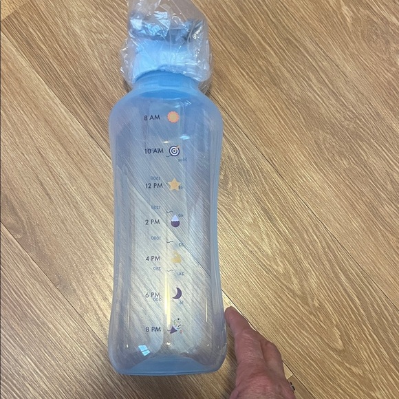 Tupperware Blue Water Bottle 12 hour water bottle with time and measurements. - Picture 1 of 5